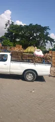 Nissan 100 2010 Off White Mini Truck - 1
