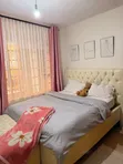 5x6 White Leather Bed with Ottoman - 2