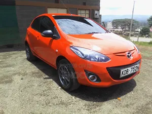 Mazda Demio 2013 Nyekundu