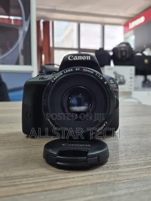 Canon EOS Rebel SL1 DSLR Camera with 50mm f/1.8 Lens