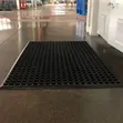 Black Hollow Drainage Mat for Wet Workspaces - 1