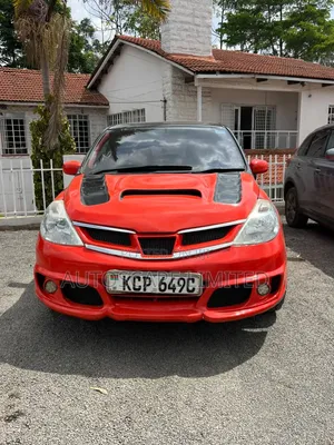 Nissan Tiida 2010 Orange
